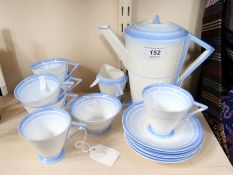 A Shelley Art Deco style china coffee service comprising six cups and saucers, a cream jug, sugar