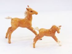 Two Beswick model horses, mother with fo