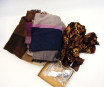 A Gucci wool shawl and a small quantity