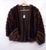 A mink cape, with armlets (sr)