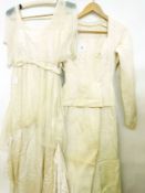 A cream brocade wedding dress, 1954, tog