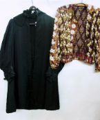 A Victorian black silk cape with quilted