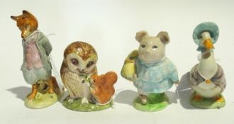 Four Beatrix Potter figures, 