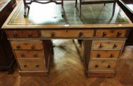 A Victorian oak pedestal desk with inset