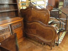 Louis XV style walnut bedstead with foli