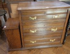 An oak chest of three long graduated dra