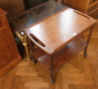 A rectangular framed marble top coffee t