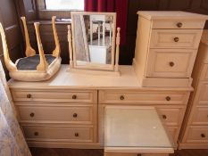 A contemporary bedroom suite of white pa