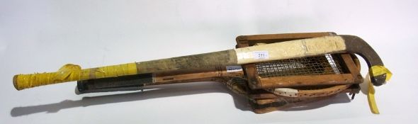 A hockey stick by Folkestone and two ten