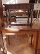 An oak rectangular top bedside table on