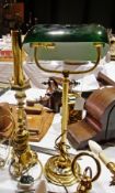 A brass and glass desk light and another