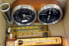 Pair Taylor dials viz:- barometer and an