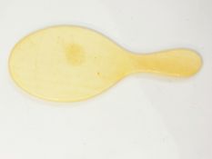 Carved ivory miniature group of two dogs