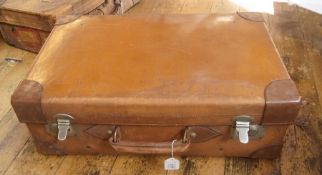 Hide suitcase with reinforced corners an