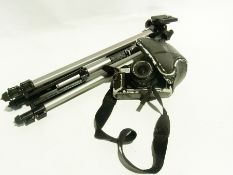 A collection of cameras, tripods and oth