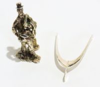 Pair of silver tongs in the form of a wi