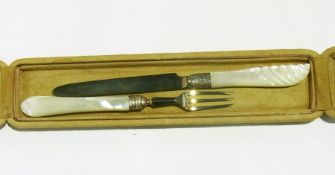 A Victorian matched silver knife and fork with mother-of-pearl handles