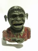 Reproduction painted metal Jolly figure money box