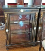 A pair of early 19th century ebonised si