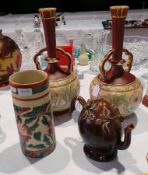 A pair of Old Hall pottery ball and shaft vases in the aesthetic style, 22 cms ,