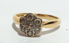 9 ct. gold and diamond flowerhead ring a