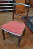 A set of eight (six plus two) George III mahogany dining chairs having pierced ladderbacks to