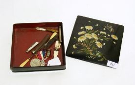 A collection of medals, one of which is