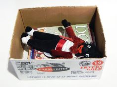 Small quantity doll related books and magazines and a Dean's Traditional golly in black velvet