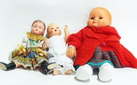 German composition small baby doll in lace trimmed pantaloons and white cotton shift dress and two