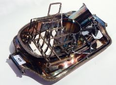 A quantity of silver plate to include six-division toast rack, serving dishes, cream jug,