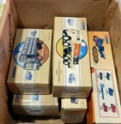 Quantity of Corgi Classics lorries (boxed) and Matchbox models of Yesteryear vehicles in window
