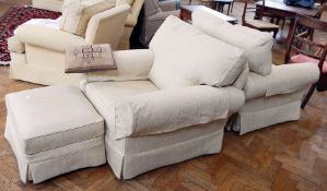 Two cream weave armchairs with a footstool