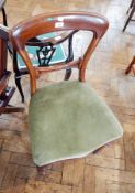 A Victorian mahogany balloon-back dining chair with upholstered stuffover seat,