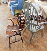 A 19th century ash wheelback Windsor slatback armchair with elm seat, on turned legs,