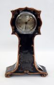 Art Nouveau mantel clock in the style of a miniature longcase with floral copper edging and eight-