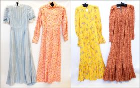 A 1970's Dove Clothing Company full length cotton dress, leg of mutton sleeves, tie bodice with a