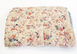 A child's quilt showing parrots and exotic birds, trimmed with pale blue  Live Bidding: If you would