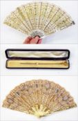 Sequin on gauze fan, mother-of-pearl sticks, with gilt decoration and metal inlay to guard, sequin
