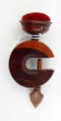 Sewing accessory being a small wooden clamp with a pin cushion Live Bidding: If you would like a