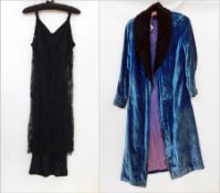 1920's black lace cocktail dress, scoop back with black satin lining hanging lower than the lace,