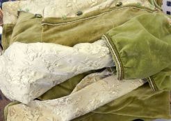 A green velvet medieval-style dress and a quantity of medieval and fantasy-style costume