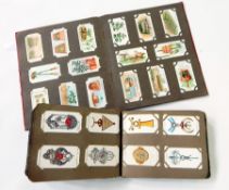 Two cigarette card albums including 