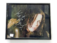 A signed Kate Beckinsale photograph, Peter Pracownik, Ian White with inscription 