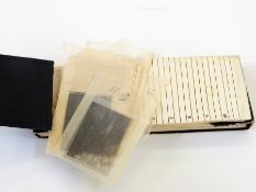 Album of various negatives including old vehicles and trains