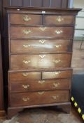 George III oak tallboy with four short drawers and five long drawers,