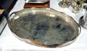 Large silver plated on copper tray with serpentine gallery sides