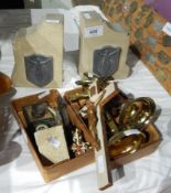 Collection of brass crucifixes and two religious figure book ends