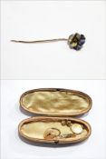 Gold-coloured metal, diamond and enamel pansy stickpin with lavender,