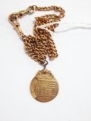 9ct gold graduated curb link double-albert chain with Edwardian 9ct rose gold perpetual calendar