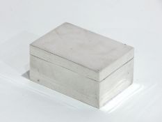 George V silver rectangular box of plain form, London 1910, 4oz approx., length 6.